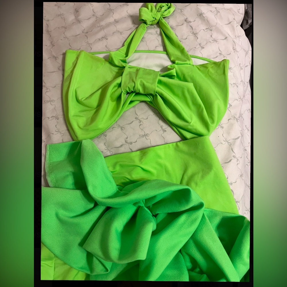 Had custom made fits likes a s-m 2 piece skirt outfit gave lots